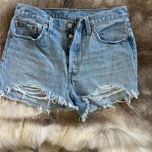 Women’s distressed Levi shorts